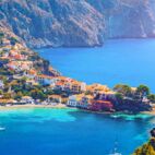 Turquoise colored bay in Mediterranean sea with beautiful colorful houses in Assos village in Kefalonia, Greece, | Von daliu